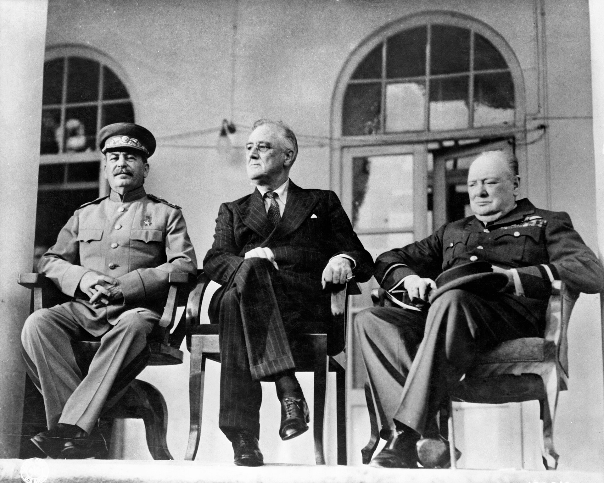 Meets Stalin and Roosevelt at Tehran