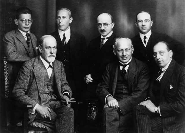 Appears with associates in Berlin